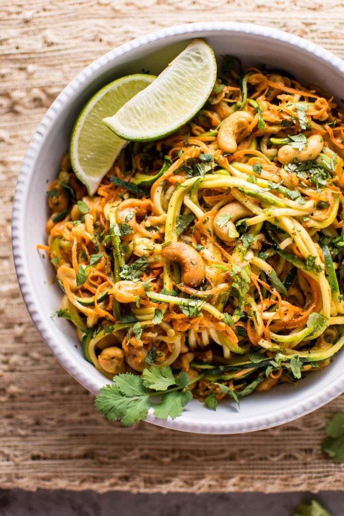 These 15 minute garlic lime cashew zoodles are a super easy and healthy vegan meal option. This is a snap to make, and the sauce is addictive!