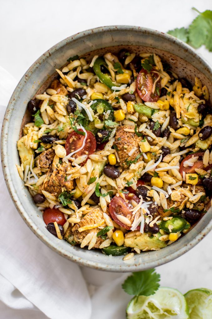 bowl of Tex-Mex chicken salad with orzo and a cilantro lime dressing