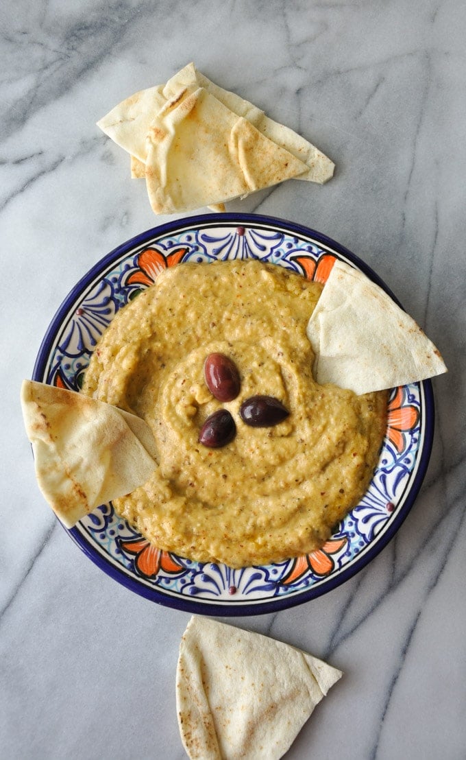 bowl of Greek roasted eggplant melitzanosalata dip with pita bread