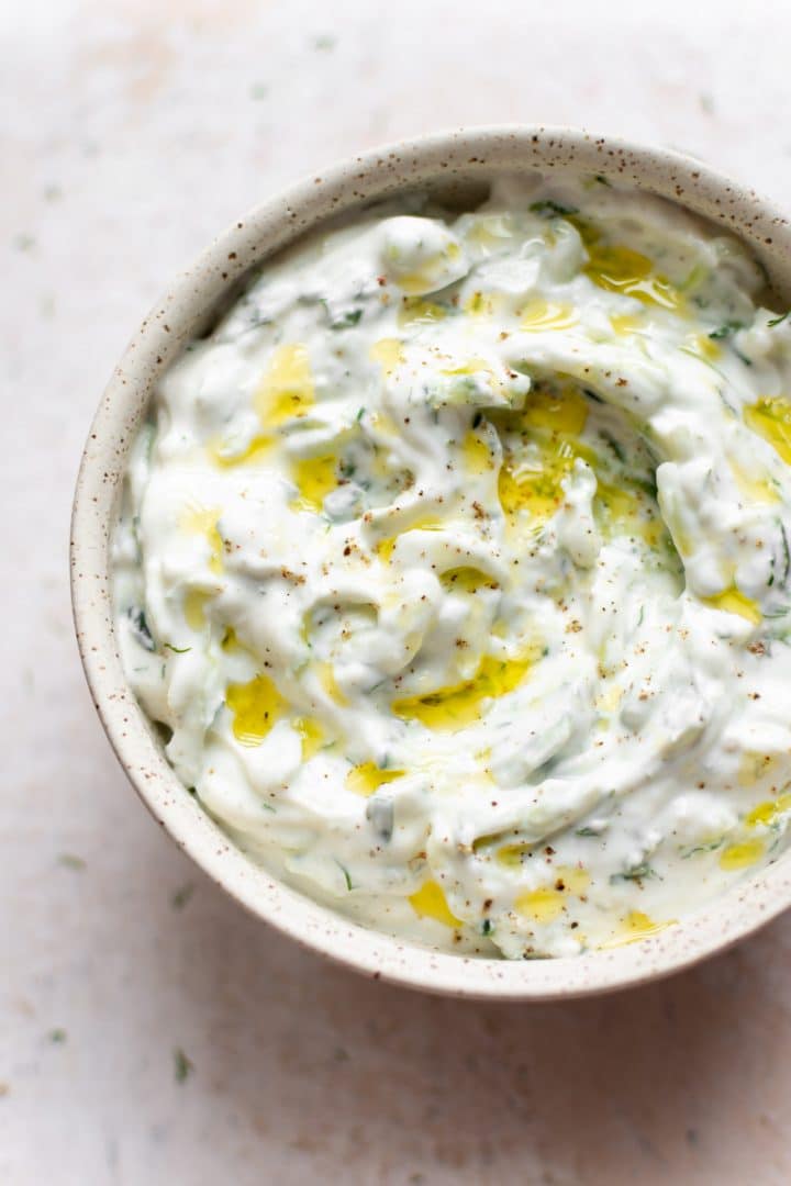 Greek tzatziki sauce in a white bowl