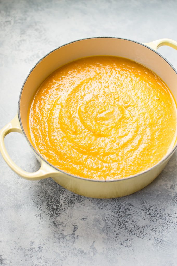 pot with acorn squash carrot soup