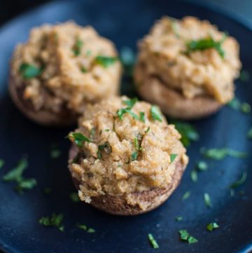 Garlic and parmesan stuffed mushrooms - the perfect easy appetizer for vegetarians and carnivores alike!