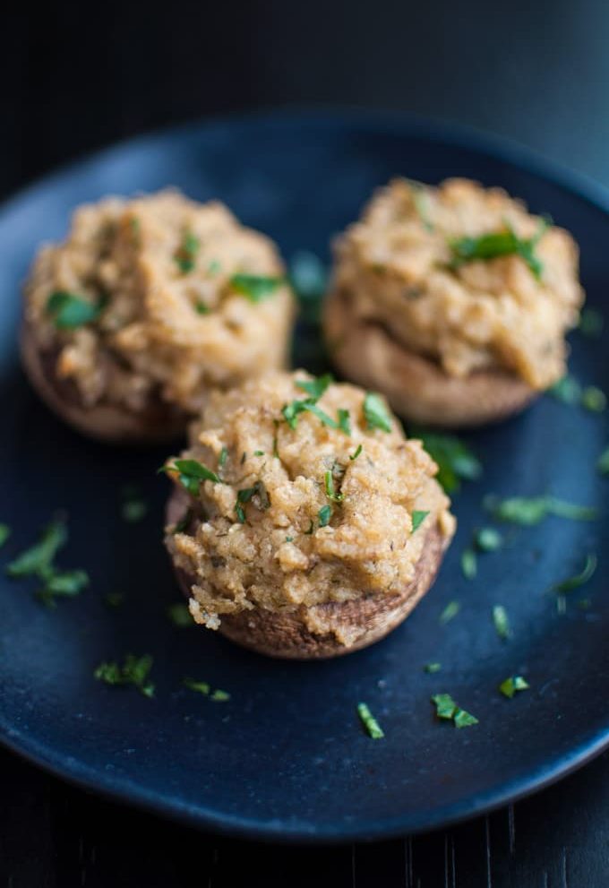 Garlic and parmesan stuffed mushrooms - the perfect easy appetizer for vegetarians and carnivores alike!