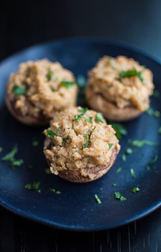 close-up of parmesan and garlic stuffed mushrooms on a plate