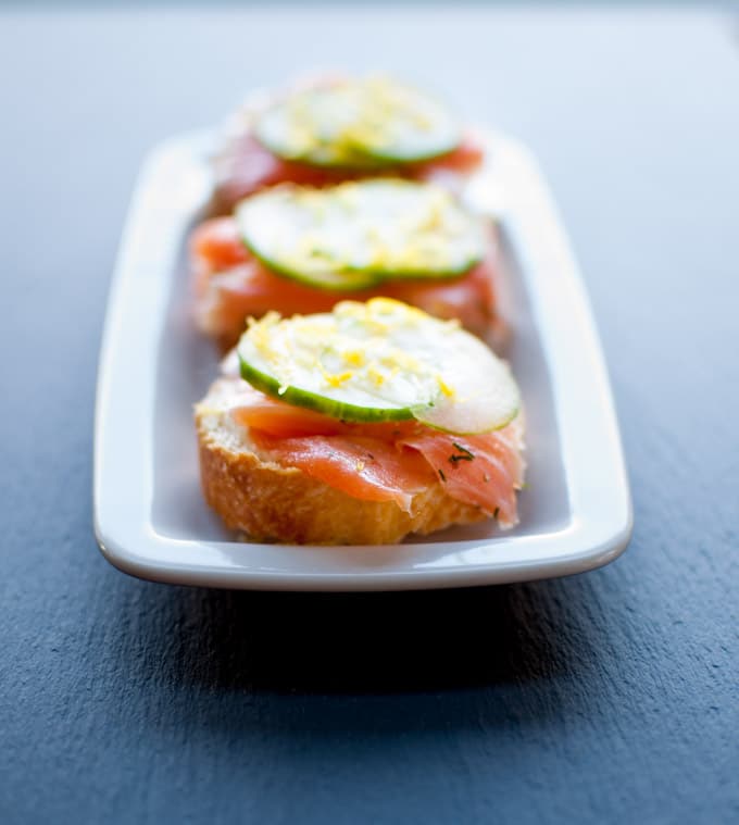 tray with three smoked salmon canapes with easy lemon truffle mayo