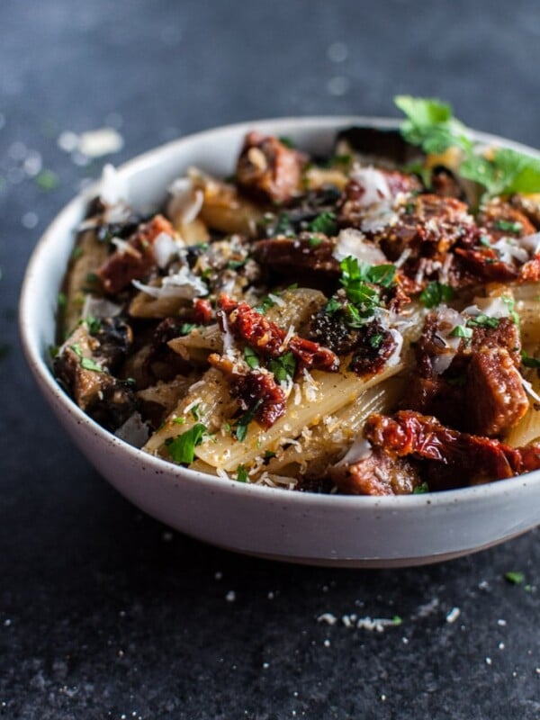 A delicious pasta dish with chorizo, portobello mushrooms, sun-dried tomatoes, and plenty of garlic!