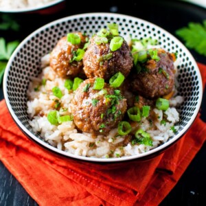 Crockpot Cranberry and Orange meatballs - an easy, comforting meal with tender pork meatballs and a sweet and sour sauce. - Salt & Lavender