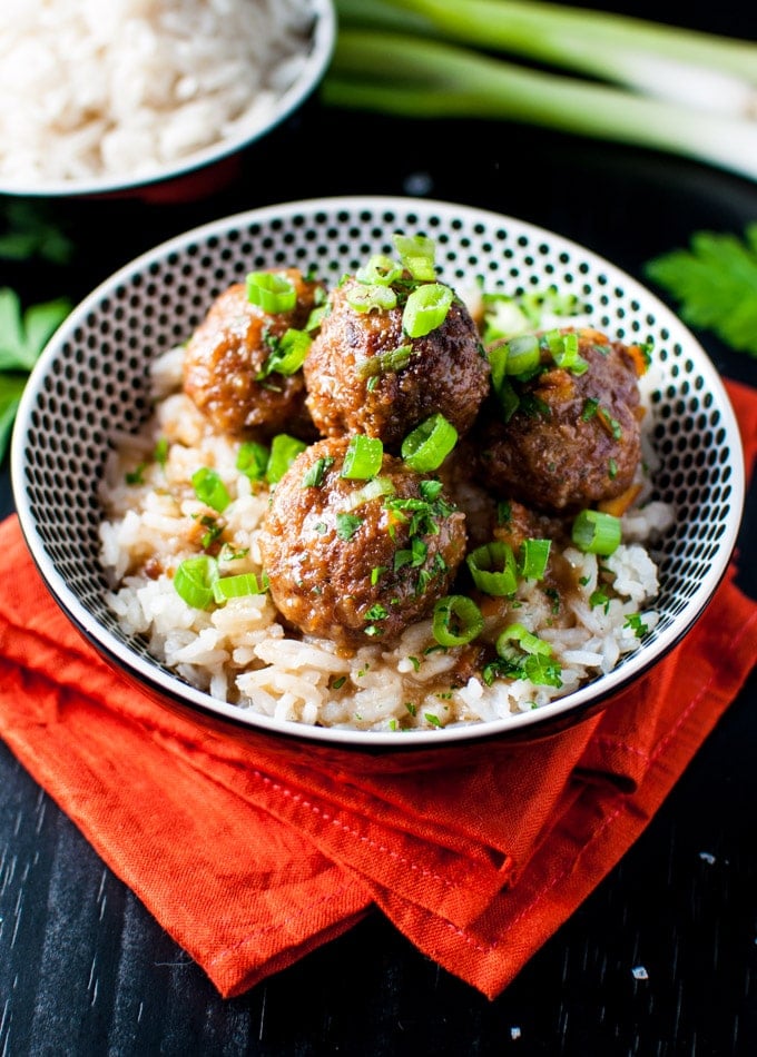 bowl with Crockpot cranberry and orange meatballs in a sweet and sour sauce