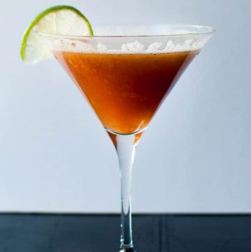 Persimmon Cocktail - a refreshing drink with persimmons, lime, creme de cassis, and champage. - Salt & Lavender