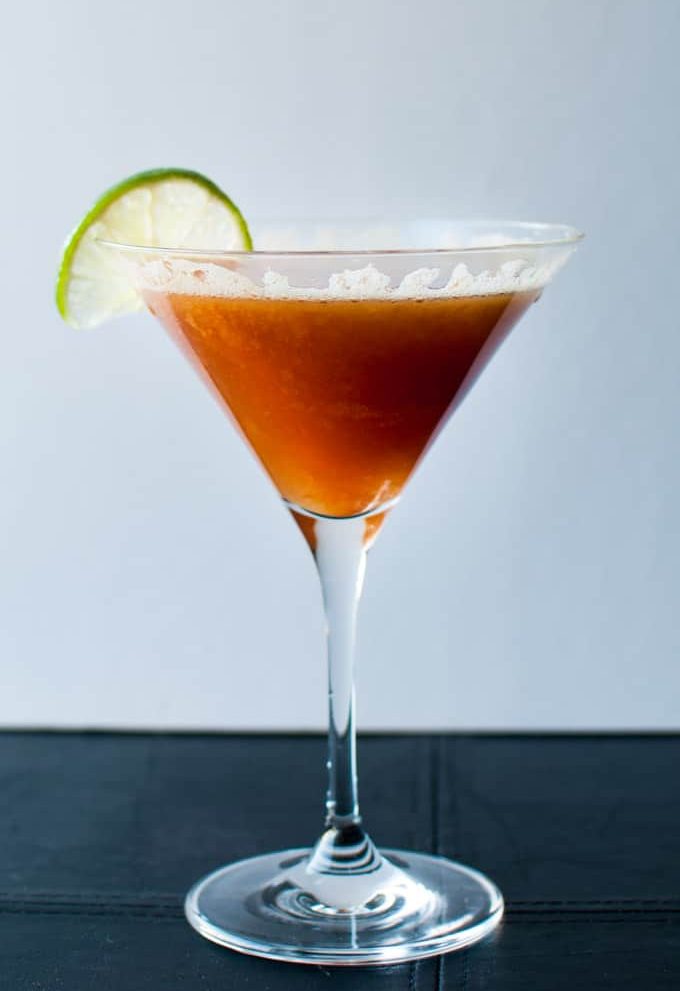Persimmon Cocktail - a refreshing drink with persimmons, lime, creme de cassis, and champage. - Salt & Lavender