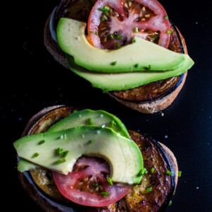 A fantastic vegetarian toast recipe with fried eggplant, avocado, tomatoes, chives, and a smoky mayo!