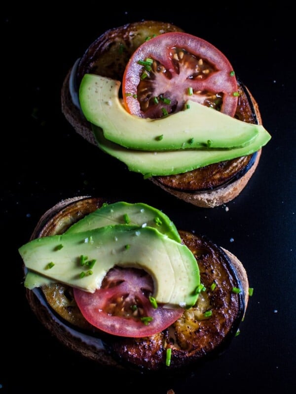 A fantastic vegetarian toast recipe with fried eggplant, avocado, tomatoes, chives, and a smoky mayo!