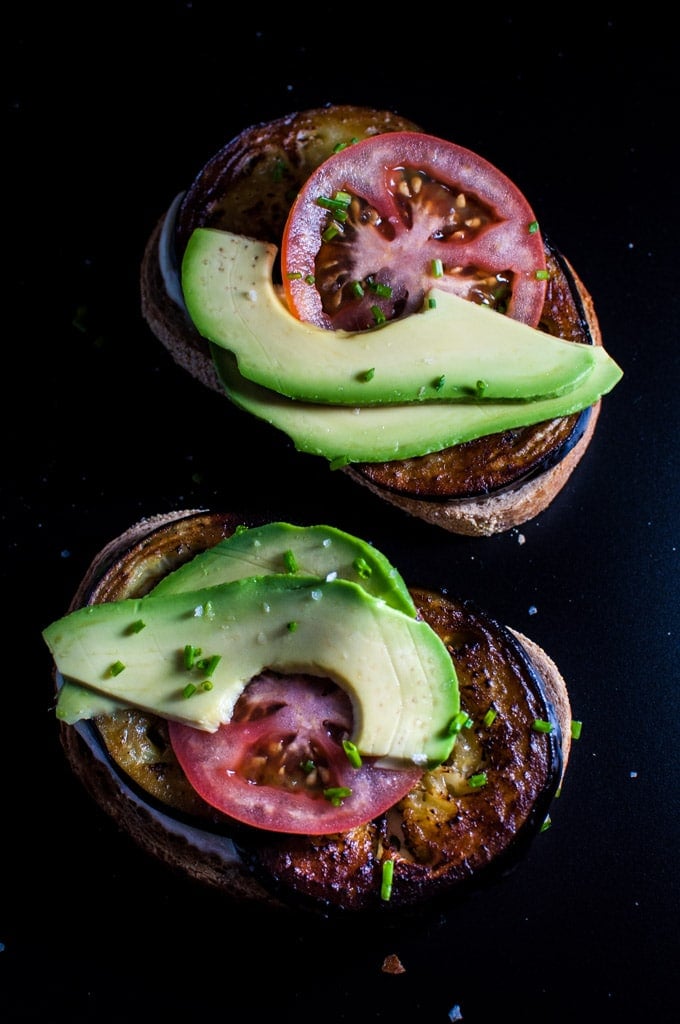 close-up of easy avocado, tomato, and fried eggplant toast with smoky mayo