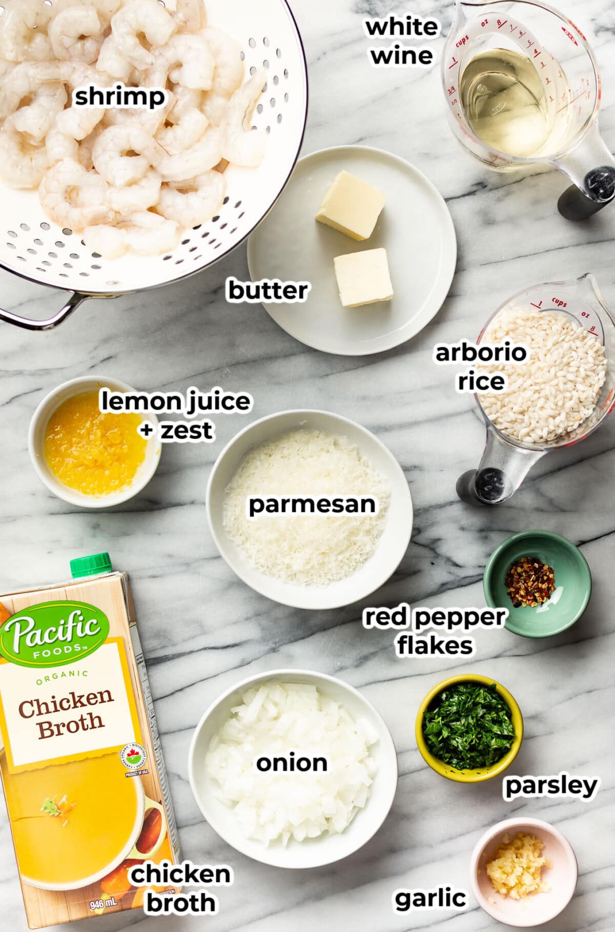 ingredients for lemon risotto with shrimp in prep bowls