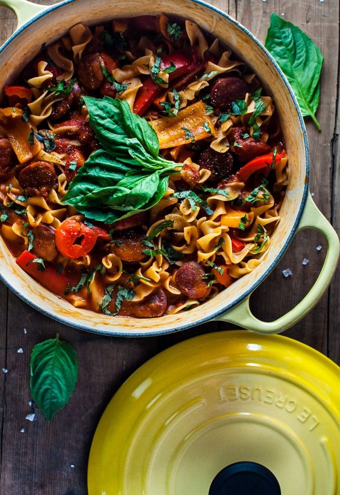 This one pot chorizo, bell pepper, and tomato noodles recipe is quick, healthy, and delicious. One pot = easy clean-up on a busy weeknight.