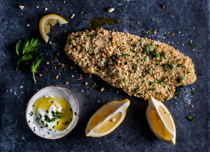 honey Dijon panko crusted basa with garlic yogurt dipping sauce and lemon wedges