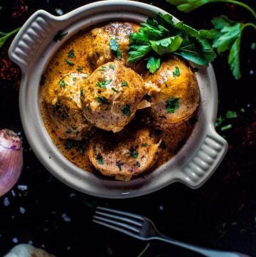 Tender chicken meatballs covered in a decadent paprika sour cream sauce.