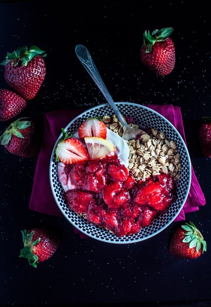 Granola with Greek yogurt and a strawberry-lemon-vanilla sauce is a lovely breakfast treat. Ready in only 15 minutes!
