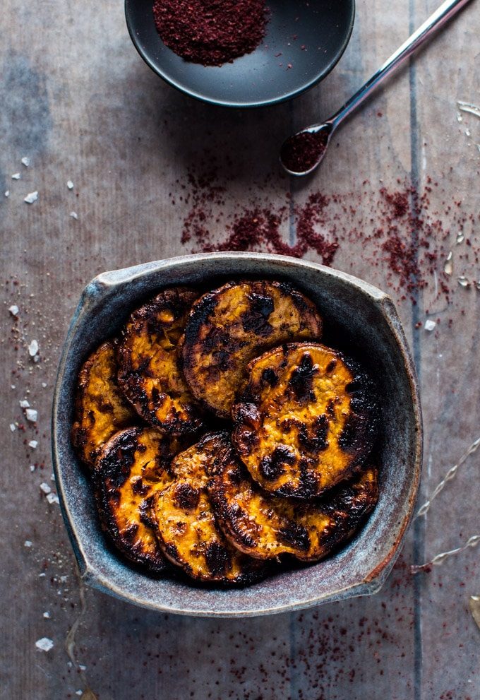 earthenware bowl with honey and sumac charred sweet potato slices
