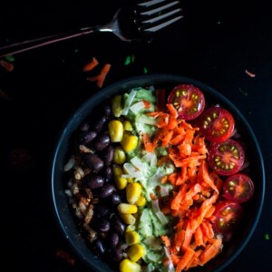 Tex Mex rice bowls with avocado lime cilantro dressing - these colorful vegetarian rice bowls are healthy, delicious, and quick to assemble.