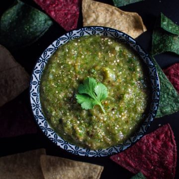 Roast your tomatillos, pop everything in the food processor, and you've got a delicious tomatillo salsa verde.