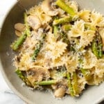 a bowl of mushroom and asparagus pasta