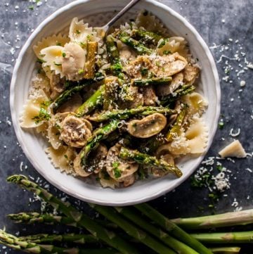 This asparagus and mushroom pasta is a super flavorful meatless dish that comes together quickly and is reminiscent of spring.