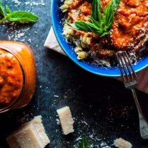 Roasted tomato and red pepper sauce - a versatile sauce that is simple to make, super flavorful, and can be used on pasta, pizza, or anywhere a tomato-based sauce is needed.