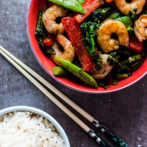 This skinny shrimp stir fry is ready in under half an hour and is packed with flavor and veggies!