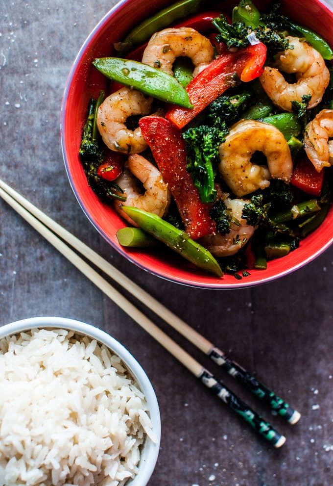 This skinny shrimp stir fry is ready in under half an hour and is packed with flavor and veggies!