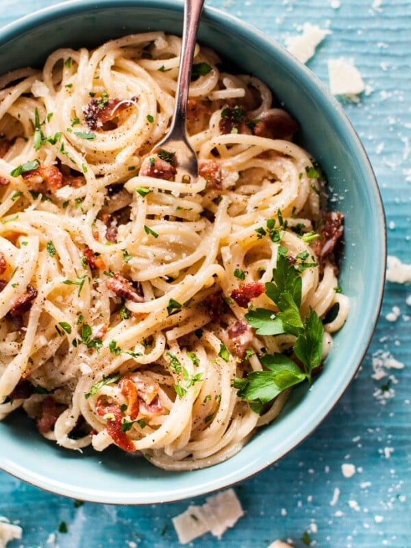 close-up of creamy bacon spaghetti on a fork