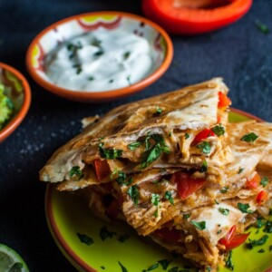 This chicken fajita quesadilla is a quick and easy meal that takes minimal effort and is especially easy if you use leftover or rotisserie chicken! Your favorite fajita fixings are sandwiched in a warm, cheesy pocket of deliciousness.