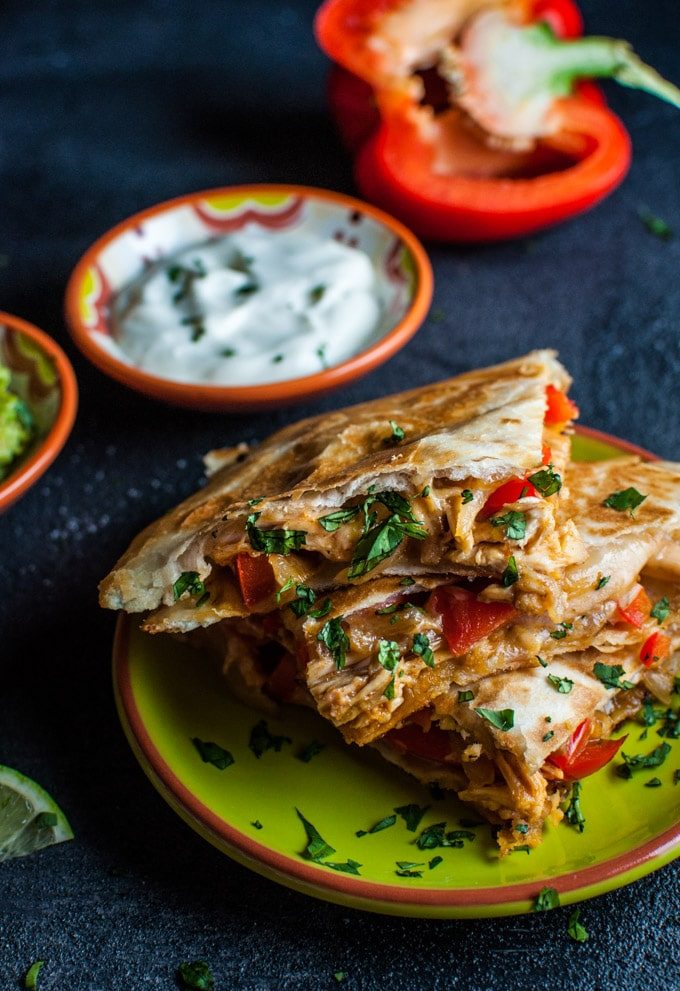 This chicken fajita quesadilla is a quick and easy meal that takes minimal effort and is especially easy if you use leftover or rotisserie chicken! Your favorite fajita fixings are sandwiched in a warm, cheesy pocket of deliciousness.