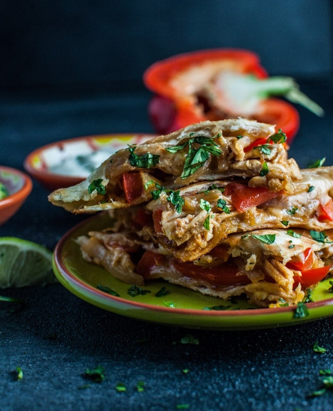 stacked chicken fajita quesadillas on a plate