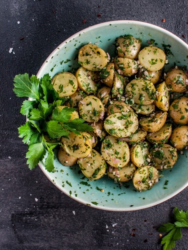 My chimichurri potato salad is packed with flavor from the fresh herbs and garlic! It's the perfect easy to prepare side dish and is ideal for those who do not like creamy potato salad.