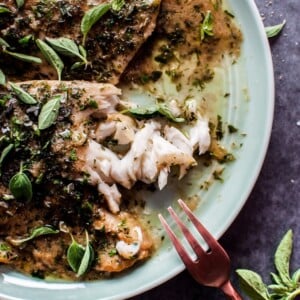 If you're looking for a fast, elegant, and easy fish recipe, look no further! Tilapia with a lemon herb butter pan sauce is the perfect fuss-free weeknight recipe because it takes less than 20 minutes!
