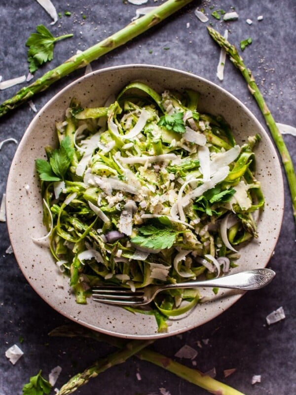 This shaved asparagus salad comes to life with a delicious lemon-Dijon dressing, shallot, fresh parsley, and parmesan cheese. It makes an awesome side salad and will take any meal to the next level!