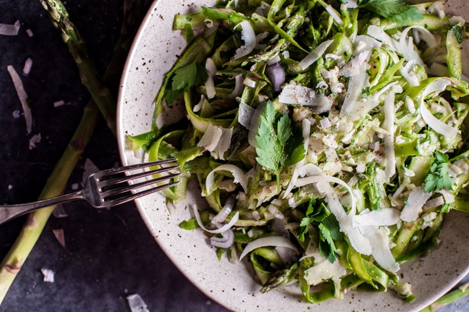 shaved asparagus salad with grated parmesan and a fork