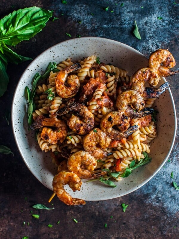 This spicy pasta with grilled shrimp is a marriage made in food heaven. The shrimp are to die for!