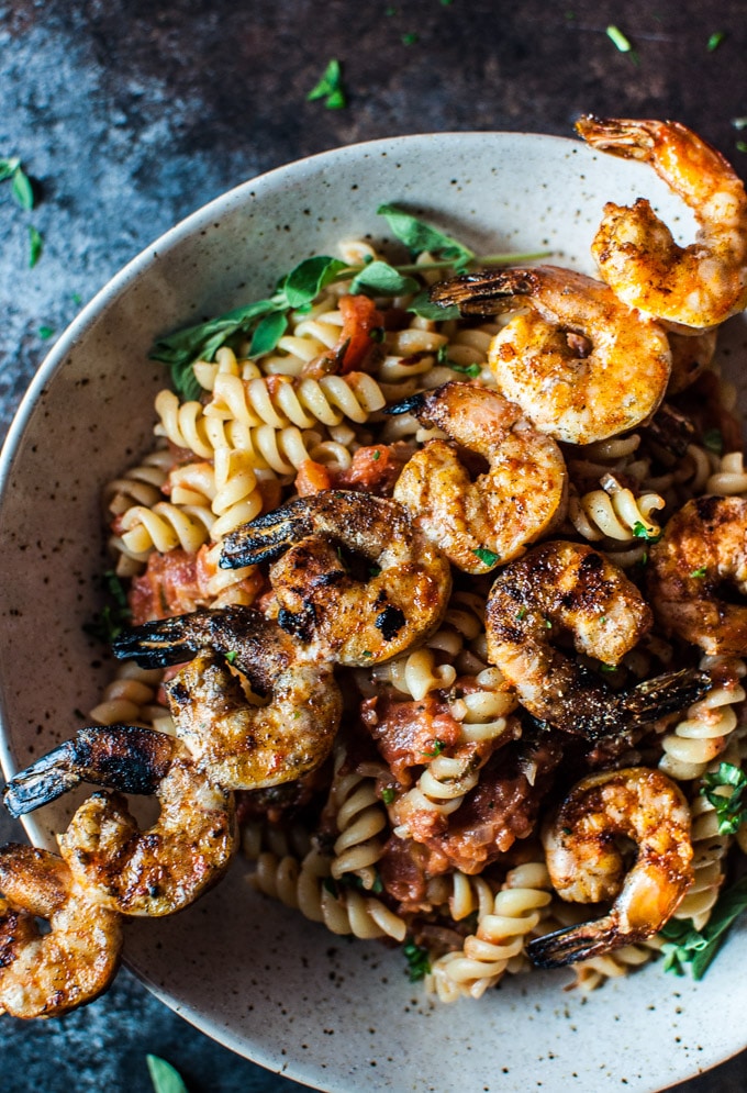 close-up of spicy grilled shrimp pasta in a bowl