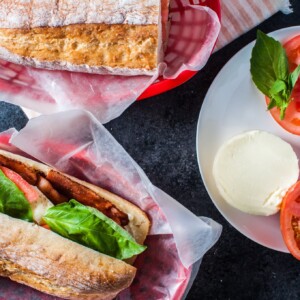 This bacon caprese sandwich is an Italian take on the classic BLT. Fresh mozzarella, basil, juicy tomatoes, and plenty of crispy bacon make this sandwich a winner!