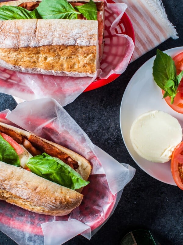 This bacon caprese sandwich is an Italian take on the classic BLT. Fresh mozzarella, basil, juicy tomatoes, and plenty of crispy bacon make this sandwich a winner!