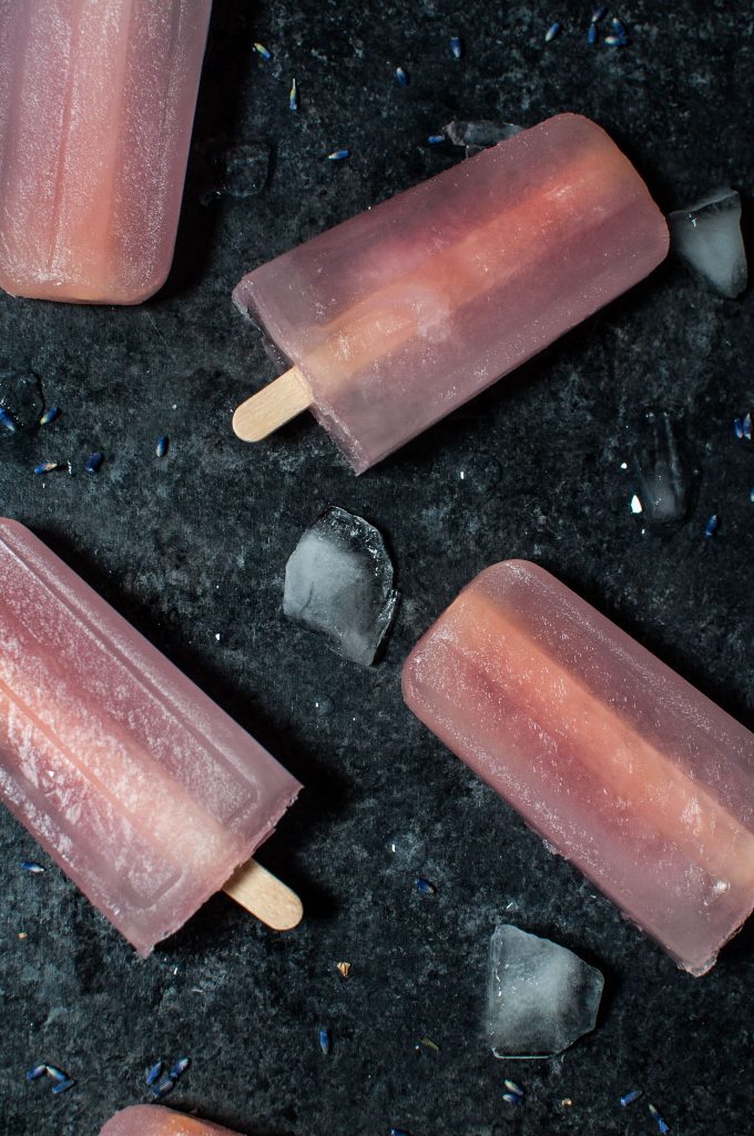 several lavender lemonade popsicles