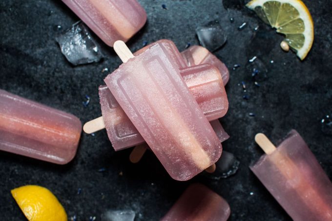 stack of several lavender lemonade popsicles