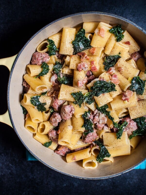 One pot rigatoni with sausage, bacon, and kale is the ultimate comfort food for pasta lovers!