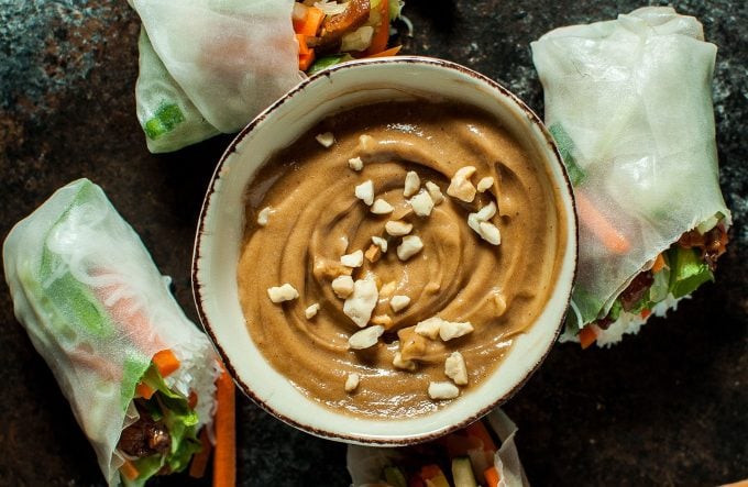 close-up of creamy peanut sauce in a small bowl