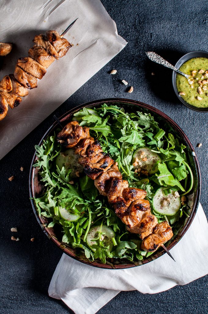 chicken kabob salad with peanut lime dressing in a bowl