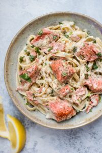 This salmon pasta with a creamy garlic sauce is quick and delicious and makes an easy and elegant meal. Ready in 20 minutes!