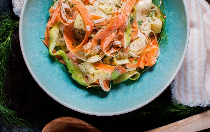 teal plate with healthy fennel, carrot, and zucchini salad