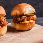 Tender fried chicken sliders with spicy mayo are a tasty little treat!